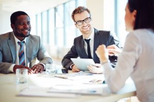 businessman-holding-tablet-in-the-meeting_1098-4073