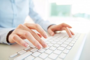 close-up-of-employee-with-computer-keyboard_1098-2019