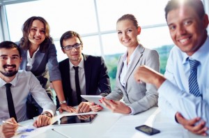 smiling-businesspeople-having-a-business-meeting_1098-2313